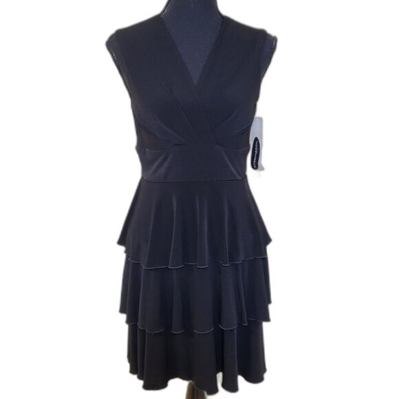 Black Ruffled Peplum V-Neck Mini Dress - Picture 1 of 11